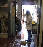 man cleaning a carpet